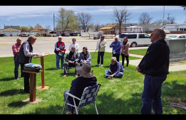 A small group gathered on the Morrill County courthouse lawn 