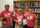 Thrivent Financial donates money for book drive